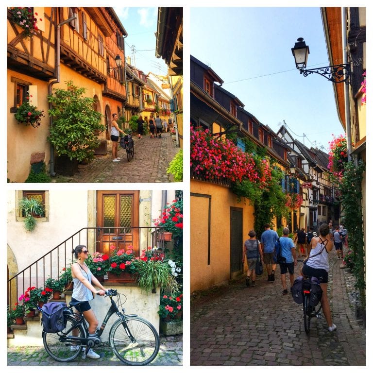 Aluguel de bicicleta em Colmar: empurrando as bike pelas ruazinhas de pedra